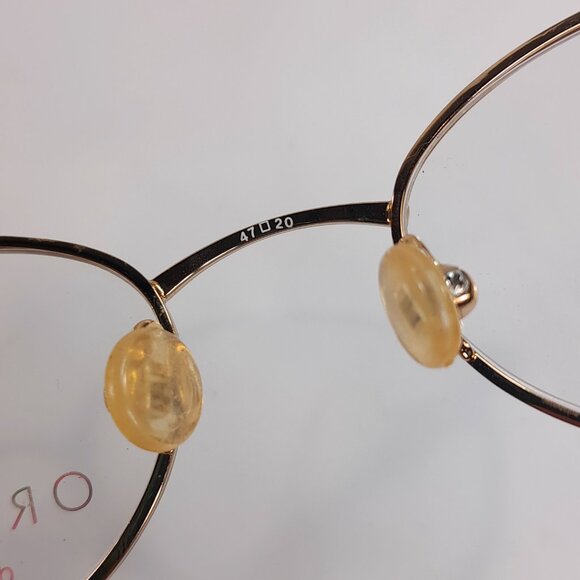 Organix Titanium 866 gold full rim eyeglasses frame 47-20-140 oval women glasses main image 6